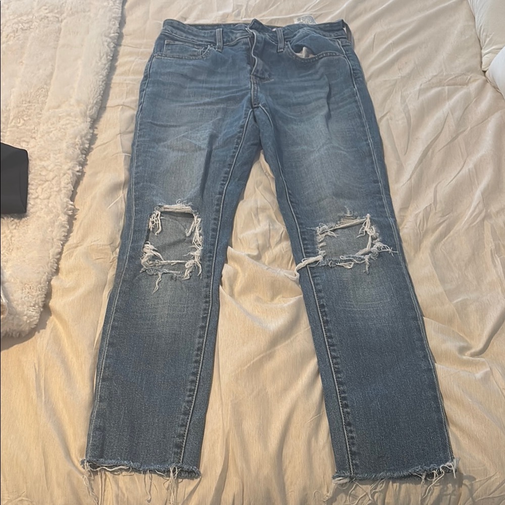 Distressed Blue Jeans
